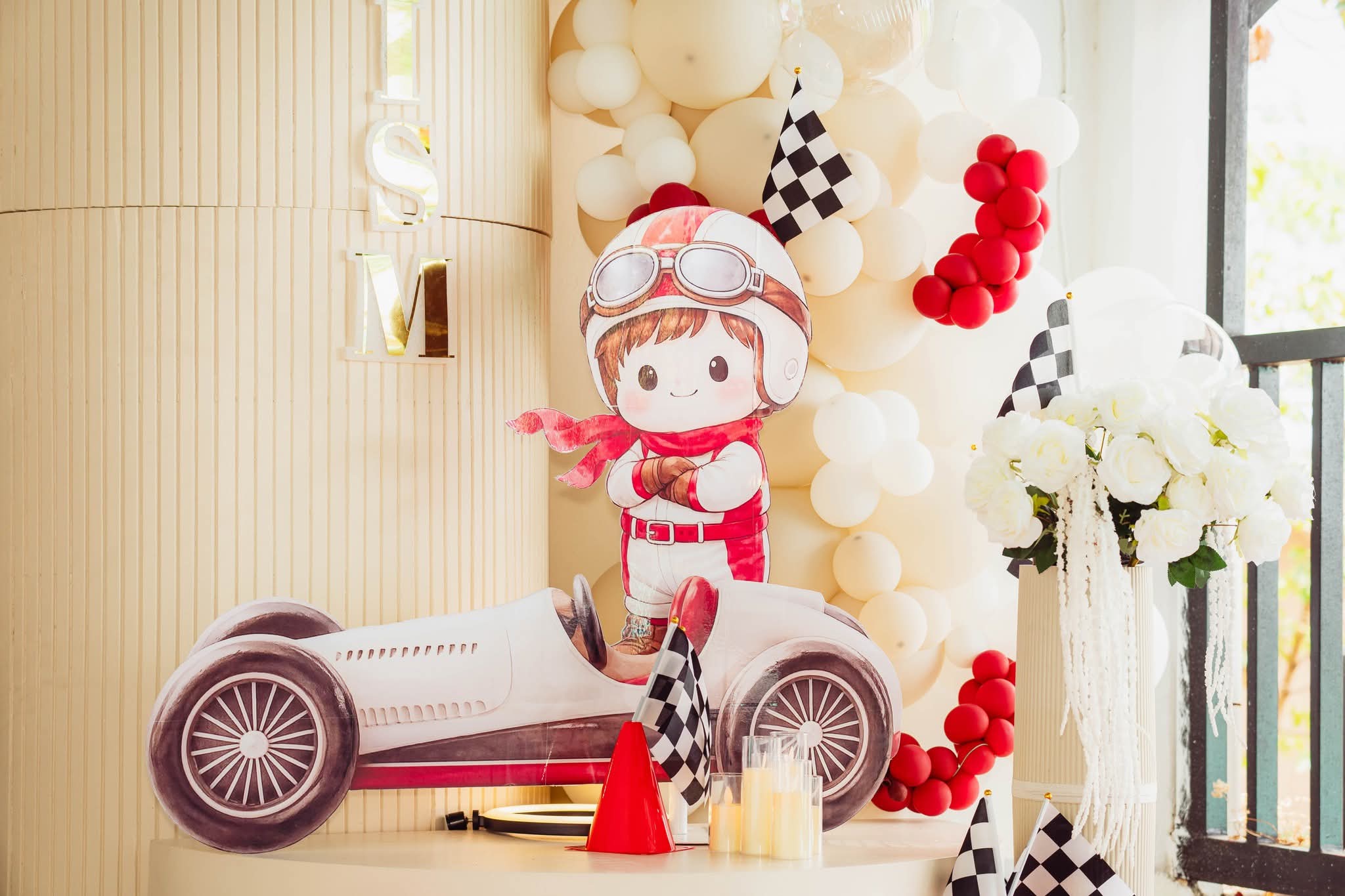 Vintage race car character detail for Cai Damien's baptism